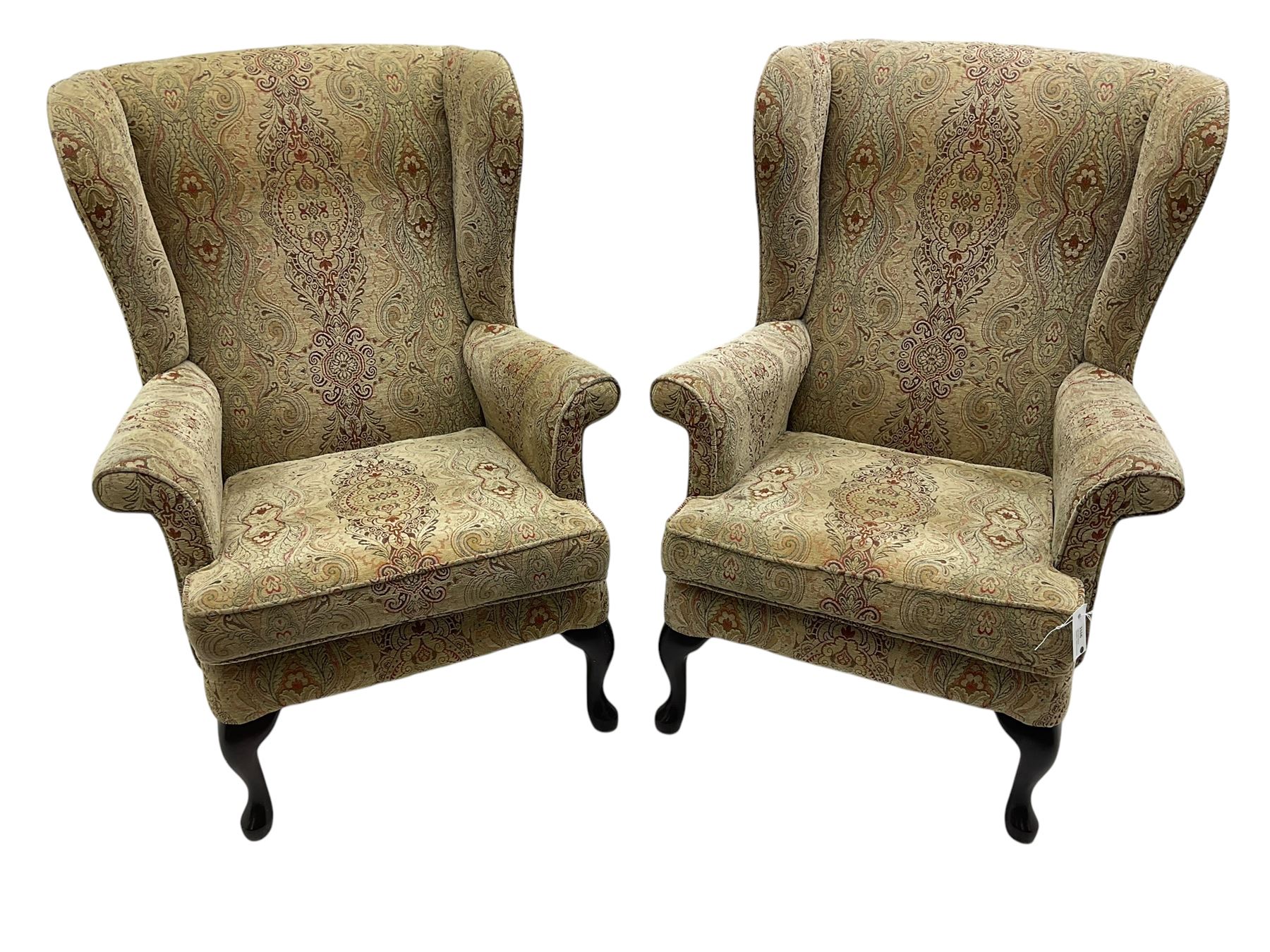 Parker Knoll - 'Burghley' pair of wingback armchairs, upholstered in 'Baslow Medallion' gold floral pattern fabric