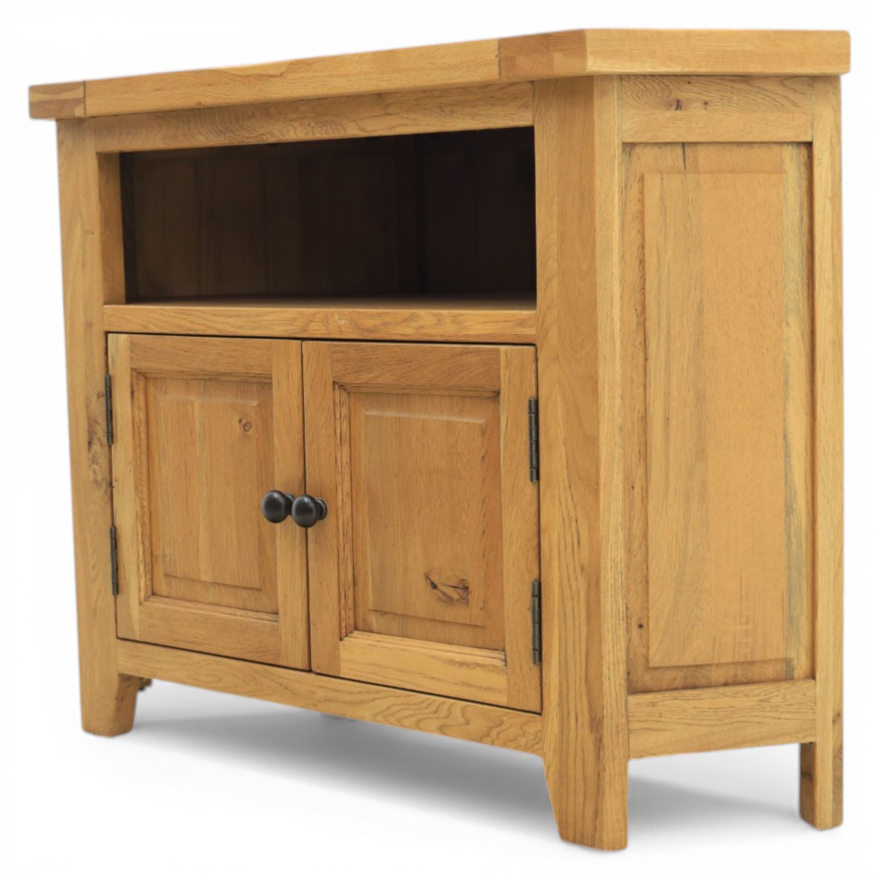 Modern light oak corner television stand, open recess above two cupboard doors with aperture to the back