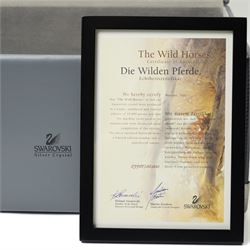Swarovski, Wild Horses, modelled as two galloping horses upon a wooden plinth, limited edition 3915/10000, with certificate and case, H20cm