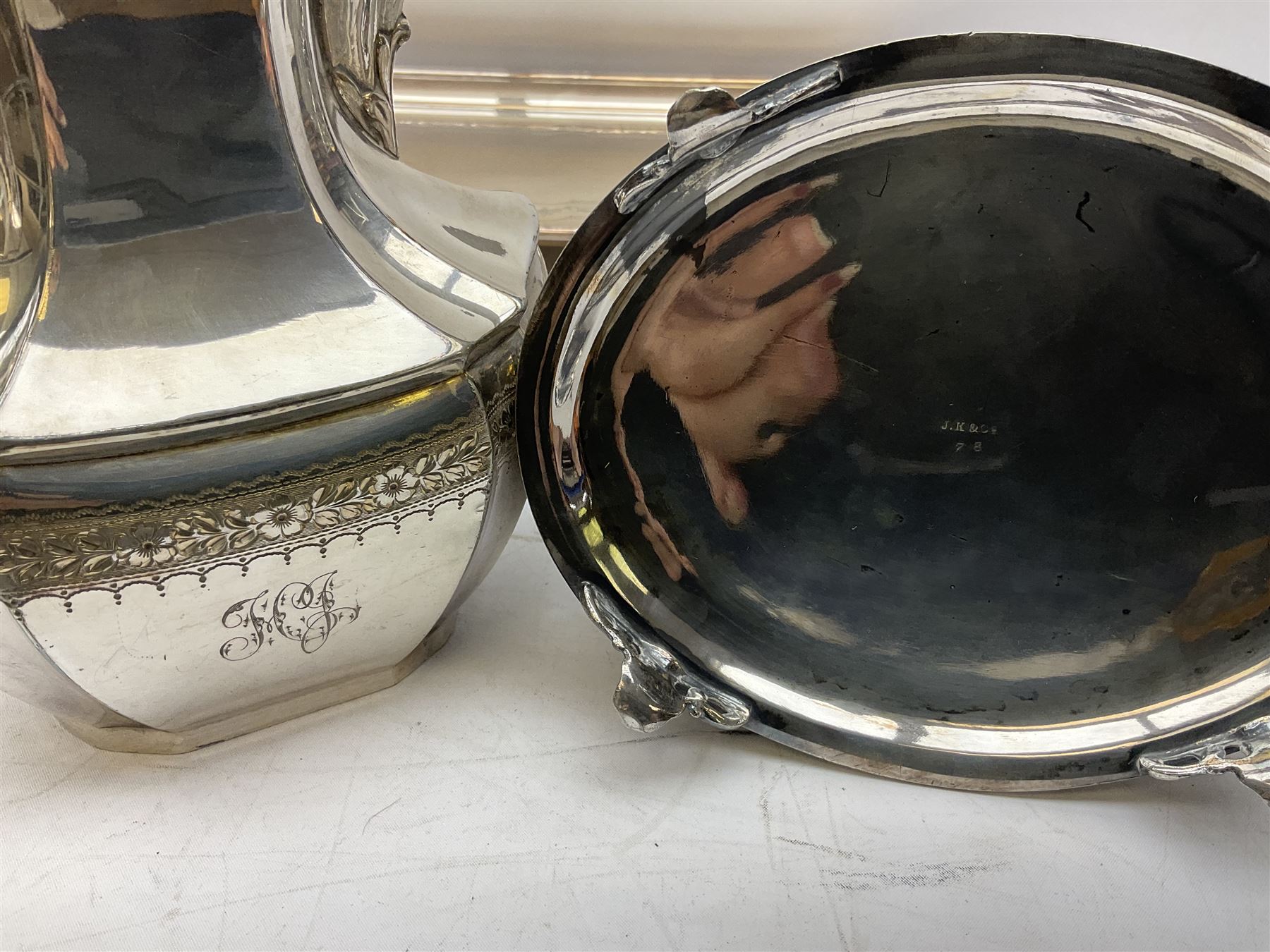 Early 20th century hallmarked silver trumpet vase stamped J & R Griffin (Joseph & Richard Griffin), Chester 1917, with weighted base, together with a 19th century silver-plate biscuit barrel by JK&Co, ornately engraved throughout, John Round & Son silver plated twin handled cup, and other silver plated and other metal ware to include ornate teapots, tray etc