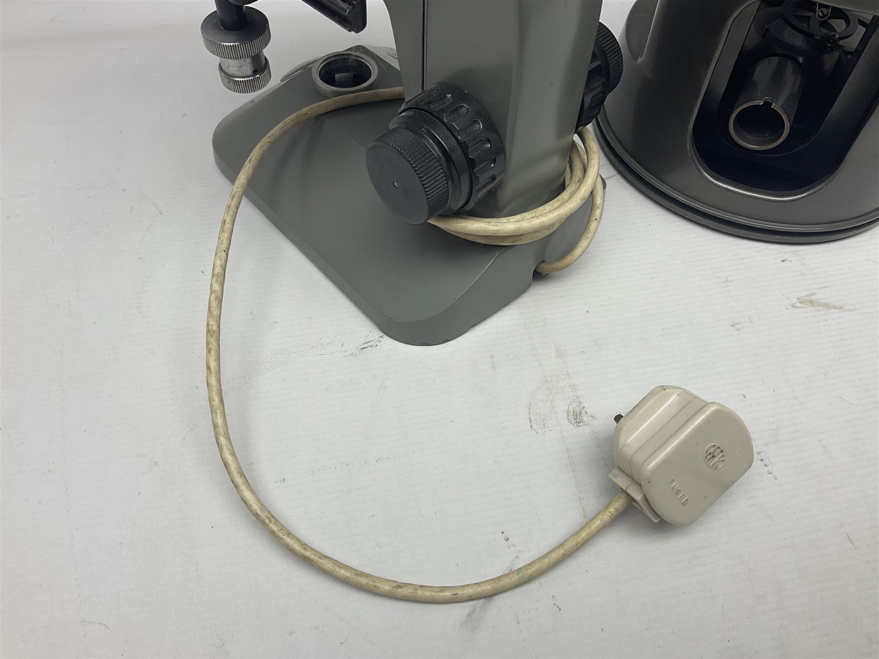 Four microscopes, comprising C Baker London Vickers, Back Diamax no 40956, Opax ABF no 232733 and one other 