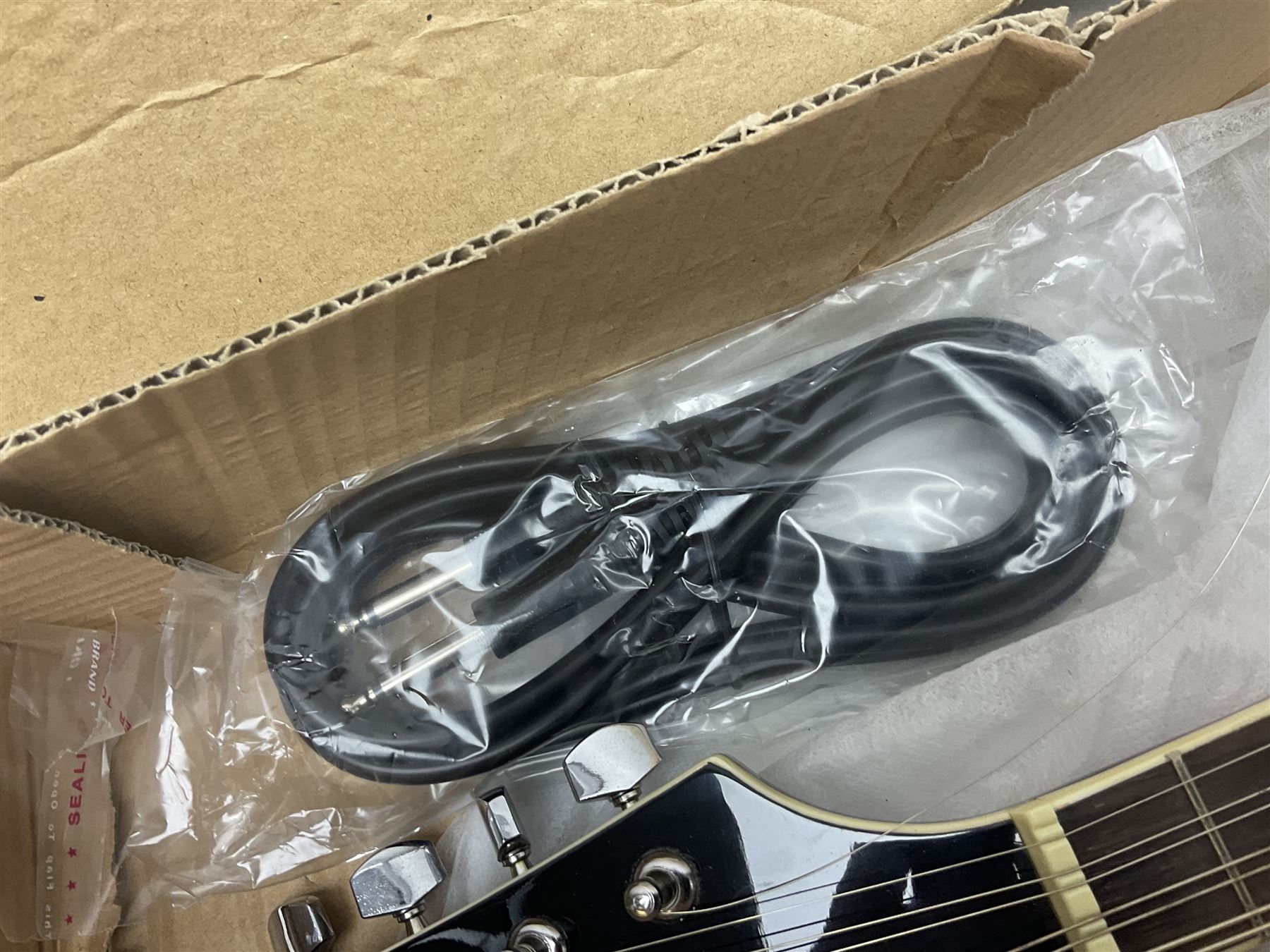 Stagg Model M50 E eight-string electro-acoustic mandolin; bears makers label L69cm; in cardboard delivery box with lead