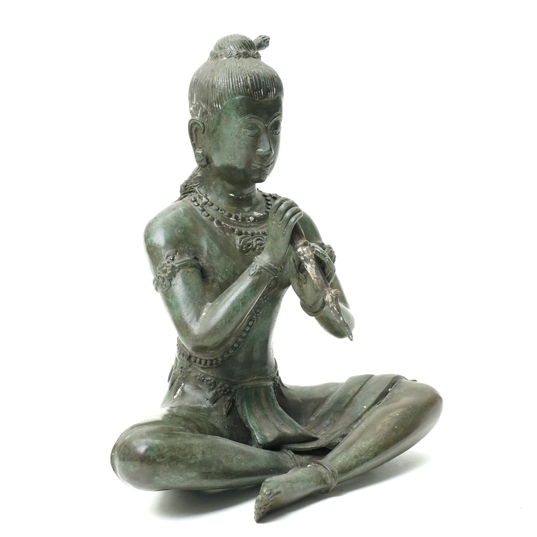 Early 20th century South East Asia bronze figure seated in the lotus position holding a dagger H28cm 