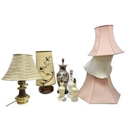 Collection of table lamps to include one of baluster form, decorated with fruit, one of squat, with a hand painted lampshade, and two standard lamps