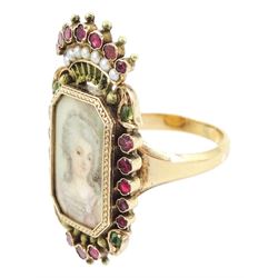 19th century 18ct gold portrait ring, set with an octagonal miniature of a woman wearing a pink dress on ivory, under a glazed panel, within a milled bezel and garnet surround, surmounted by a coronet set with seed pearls and further garnets. This lot has been registered for sale under Section 10 of the APHA Ivory Act