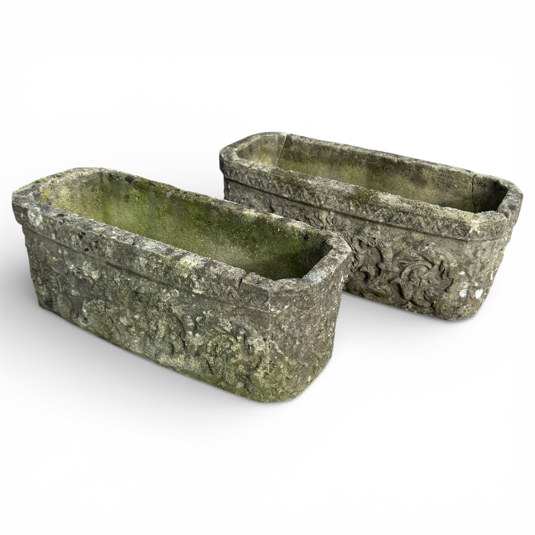 Two cast stone planters / troughs with lion emblems
