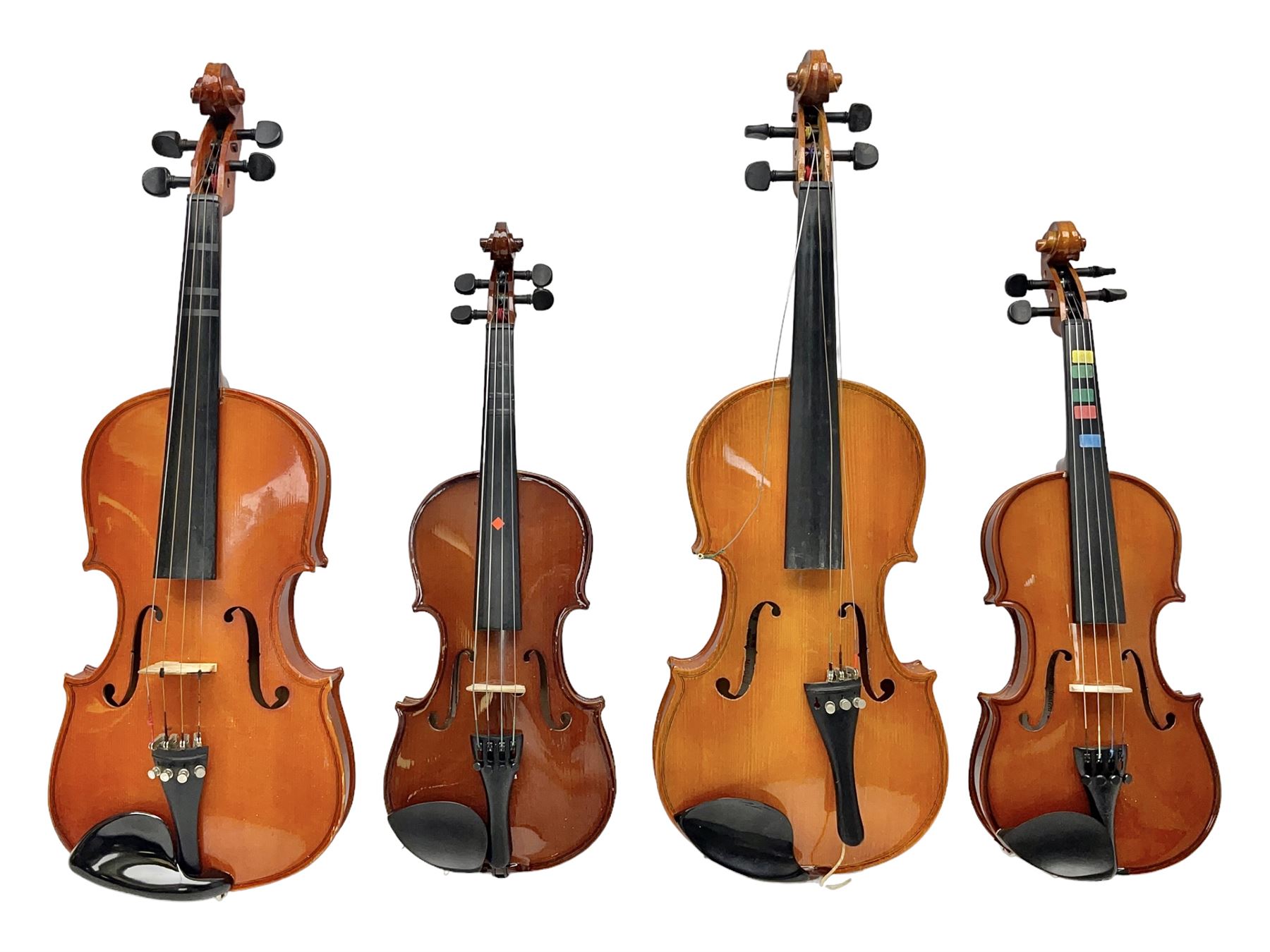 Four student violins - two Chinese three-quarter size with 33.5cm and 34cm two-piece backs; Stringers of Edinburgh quarter size with 28cm two-piece back; and Stentor quarter size with 28cm two-piece back; each in carrying case (4)