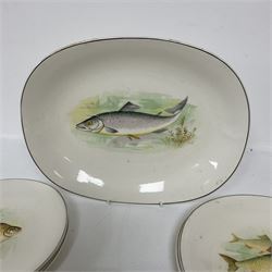 Wedgwood & Co. eight-piece fish service comprising six plates, sauce boat and larger serving plate