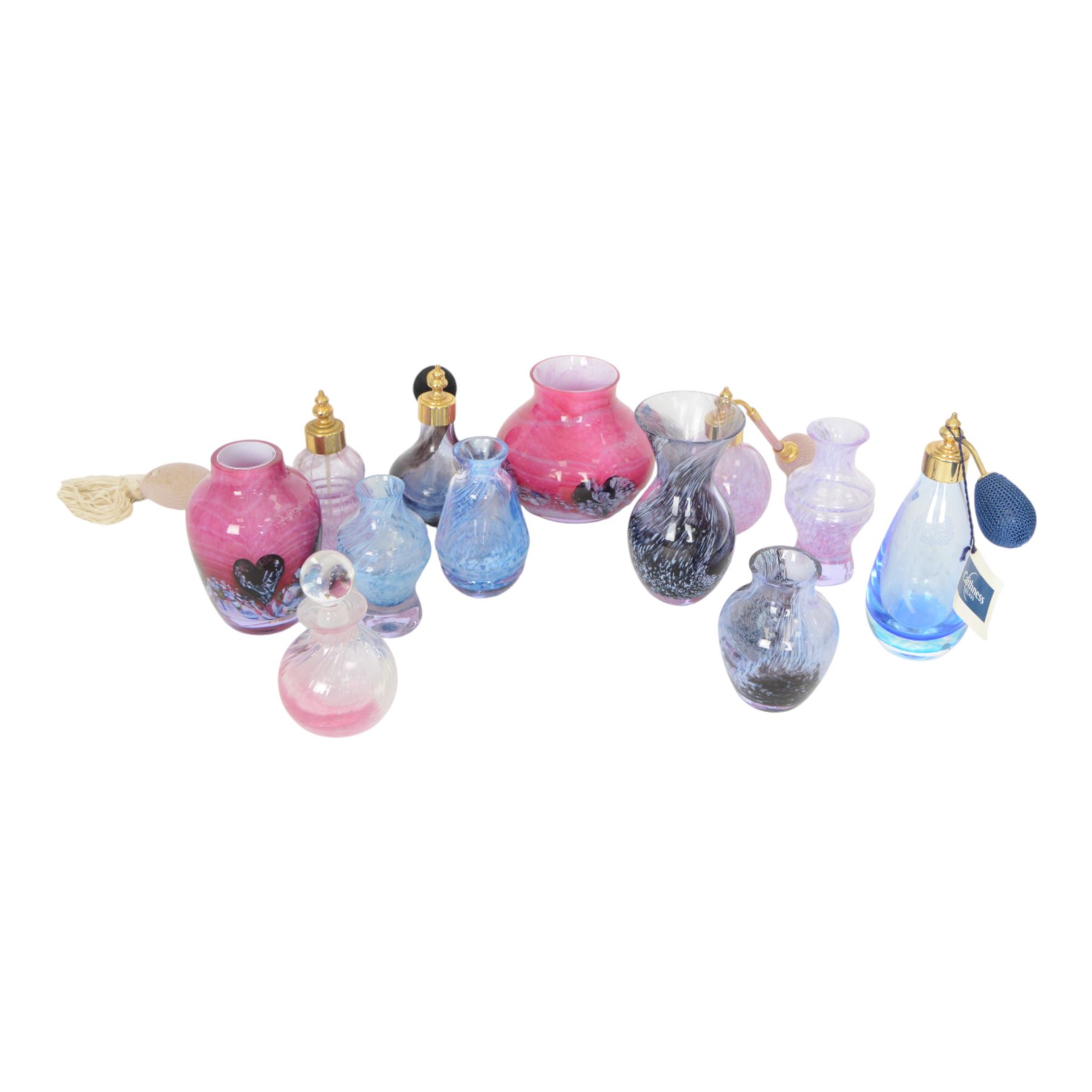 Four Caithness perfume bottles, together with seven Caithness vases 