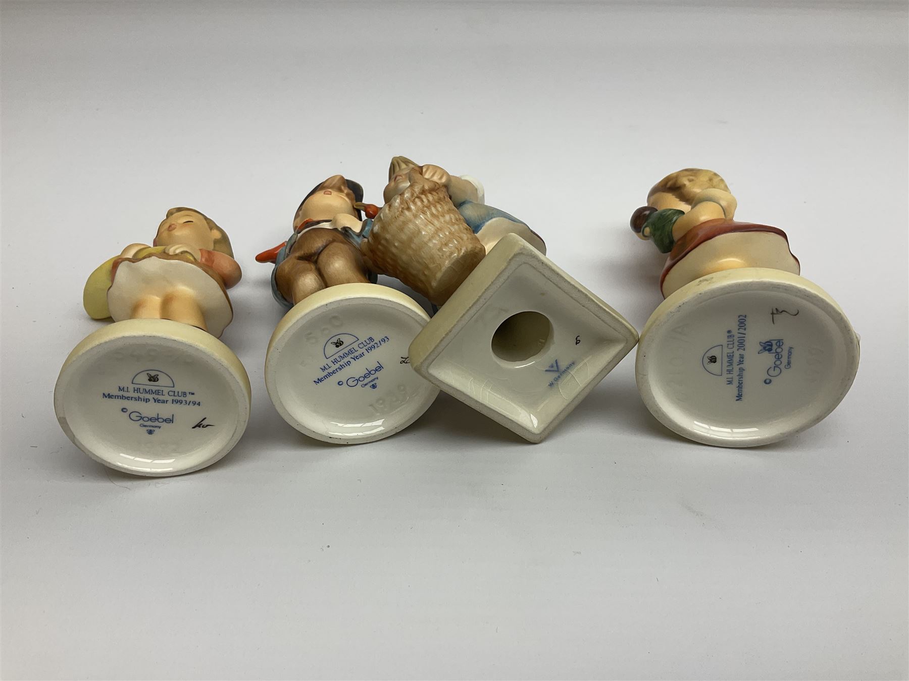 Twenty five Hummel figures by Goebel, to include Tuning up, Blessed Event, Book Worm, The Little Architect etc 