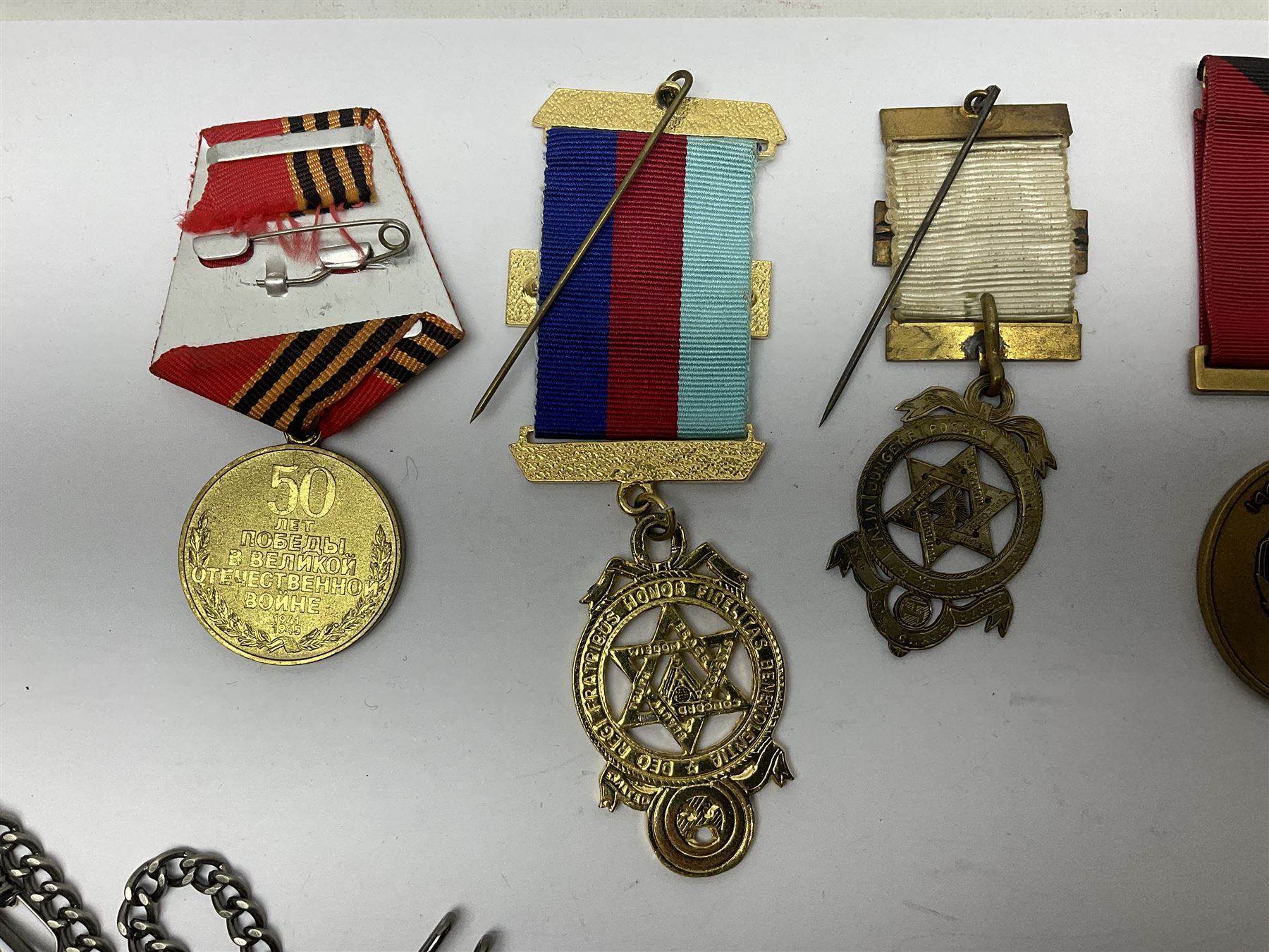 RAOB jewel Bourn Lodge 9394 with 25 years bar; two masonic jewels and triangular pendant watch; British Iron Cross style propaganda medallion; French Legion of Honour and Combatants Cross; and three foreign medals