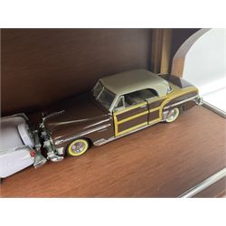 Franklin Mint 'The Classic Cars of the Fifties' collection with display rack, eleven (ex.12) die-cast models and folder of paperwork; another wall mounting display cabinet containing fifteen die-cast models; and an unused boxed Master Tools model display case