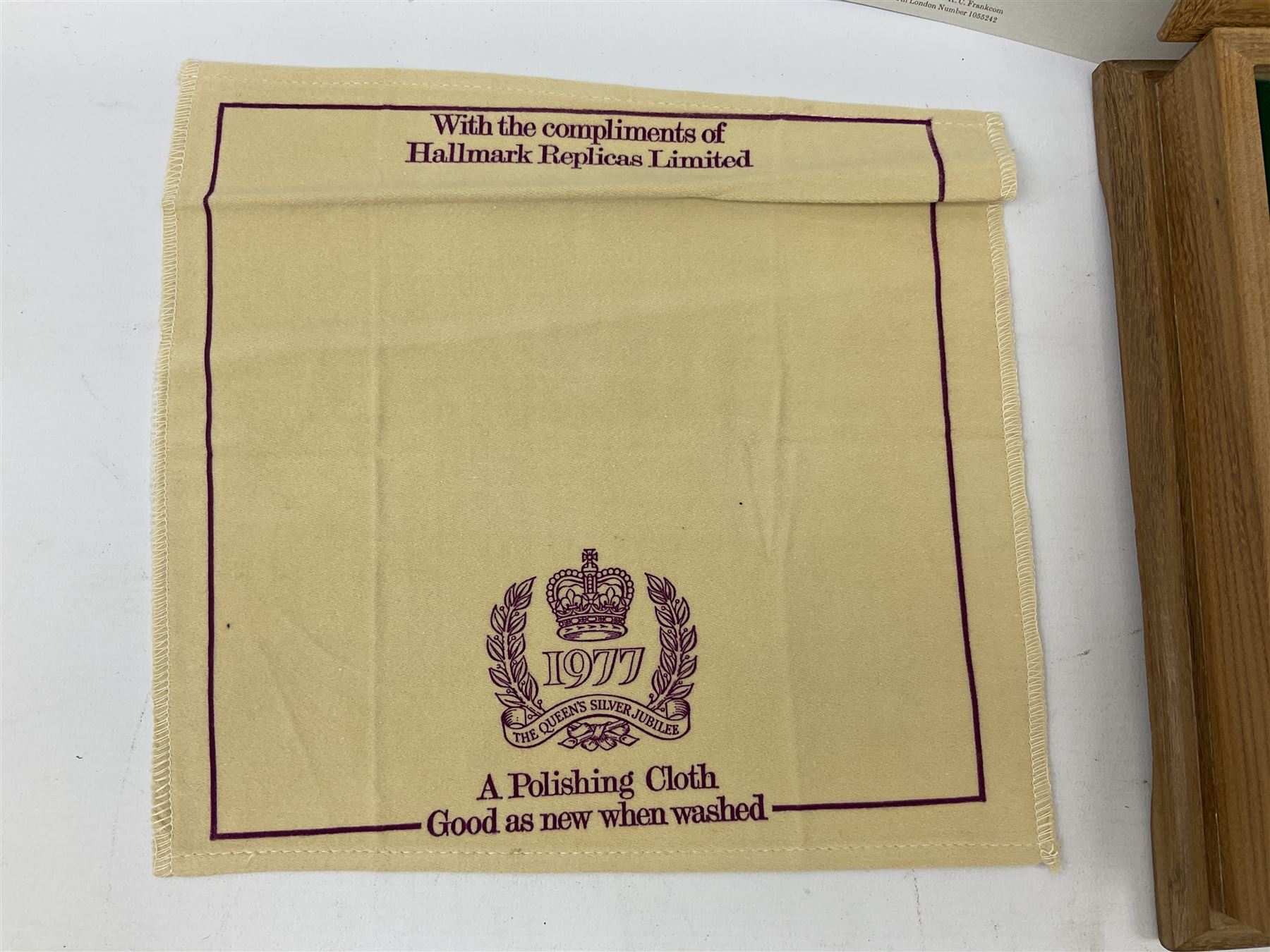 The Stamps of Royalty collection consisting of twenty-five sterling silver hallmarked stamp replicas, housed in a fitted wooden display case, with certificates, polishing cloth and certificates