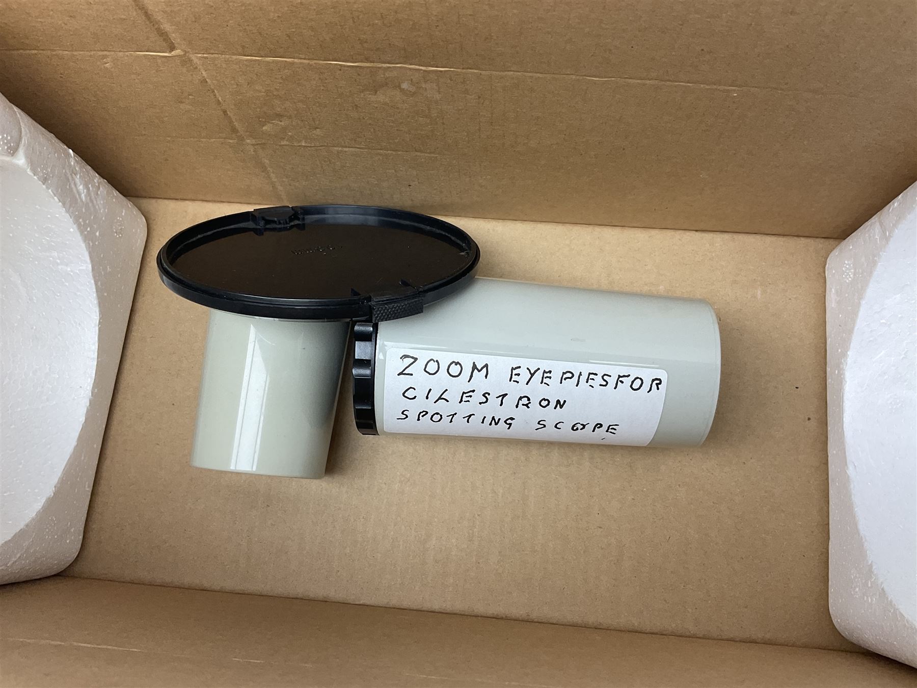 Celestron Ultima 100ED zoom spotting scope, model no. 52253, carrying case, instruction manual and in original box