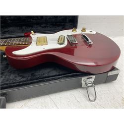 Gibson Marauder style six-string electric guitar with cherry coloured body, marked made in Japan L101cm; in locking hard carry case