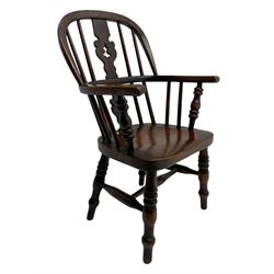 Early 19th century ash and elm child's Windsor armchair, double hoop and stick back with fretwork and pierced splat, turned supports joined by H swell turned stretchers