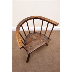  Late 18th century Welsh oak and elm primative stick back armchair, D shaped seat with curved top rail on three outsplayed supports, W60cm, D34cm, H64cm  