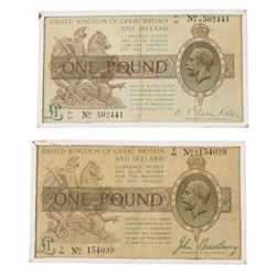 Two King George V Bradbury one pound notes, C46 154099 and P147 502441, in small glass frames
