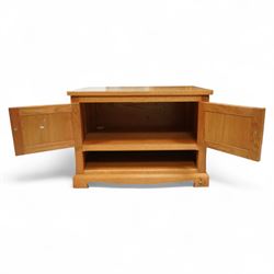 Unicornman - Yorkshire oak media cabinet, rectangular top over a pair of panelled cupboard doors with brass handles, open undertier, on shaped bracket supports above castors