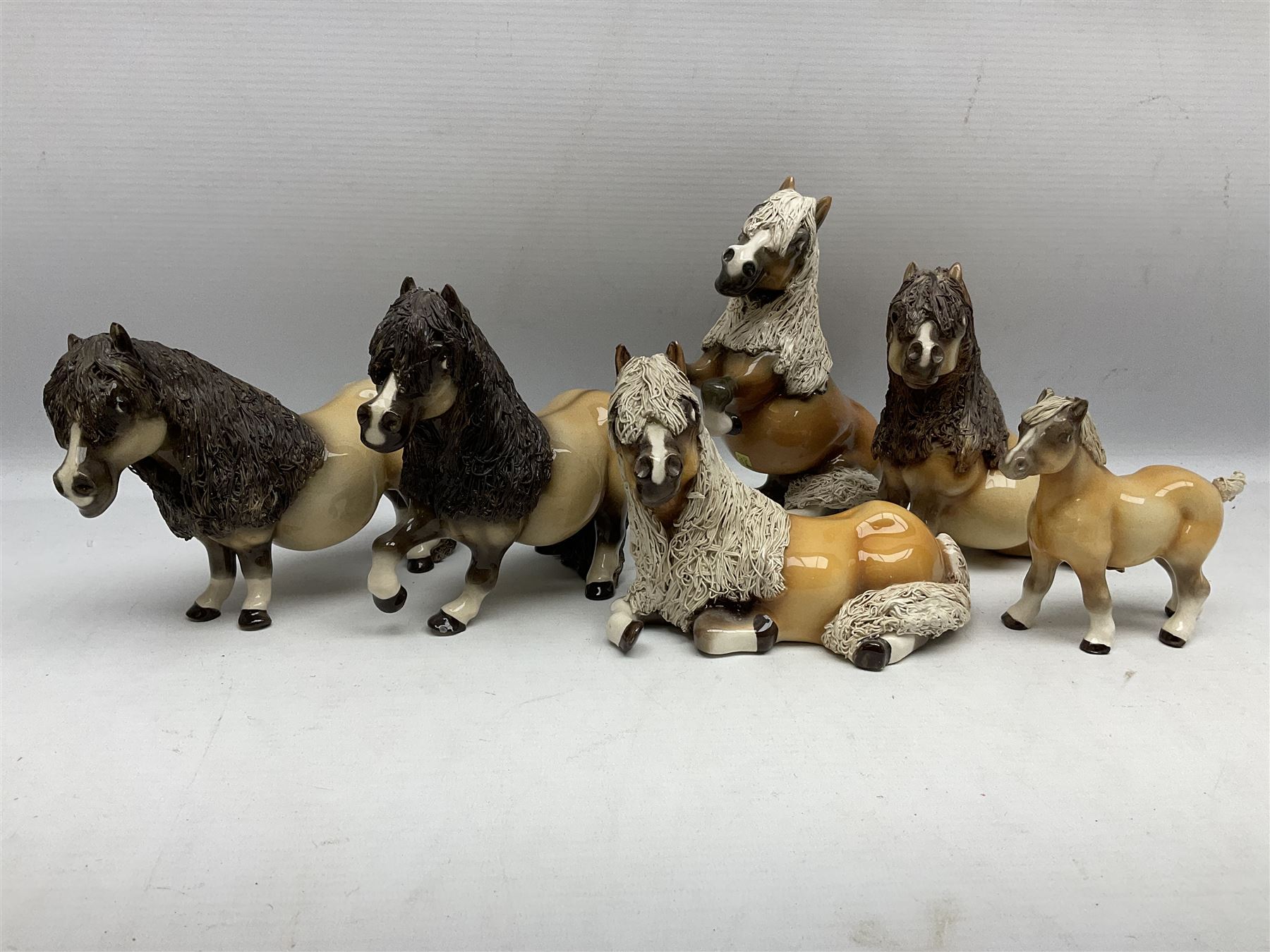 Set of six Cheval comical horse figures, modelled as Shetland ponies with spaghetti manes to include Palomino examples, all with Cheval Made in U.S.A stickers
