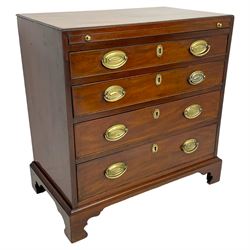 George III mahogany bachelor's chest, brushing slide over four graduating drawers, pressed brass handle plates and escutcheons with acorn and foliate decoration, on bracket feet