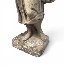 Lucas Stone - pair of cast stone garden figures, modelled as young female figures holding wheat sheafs and baskets of flowers, each on square bases, weathered finish, makers mark stamped to base