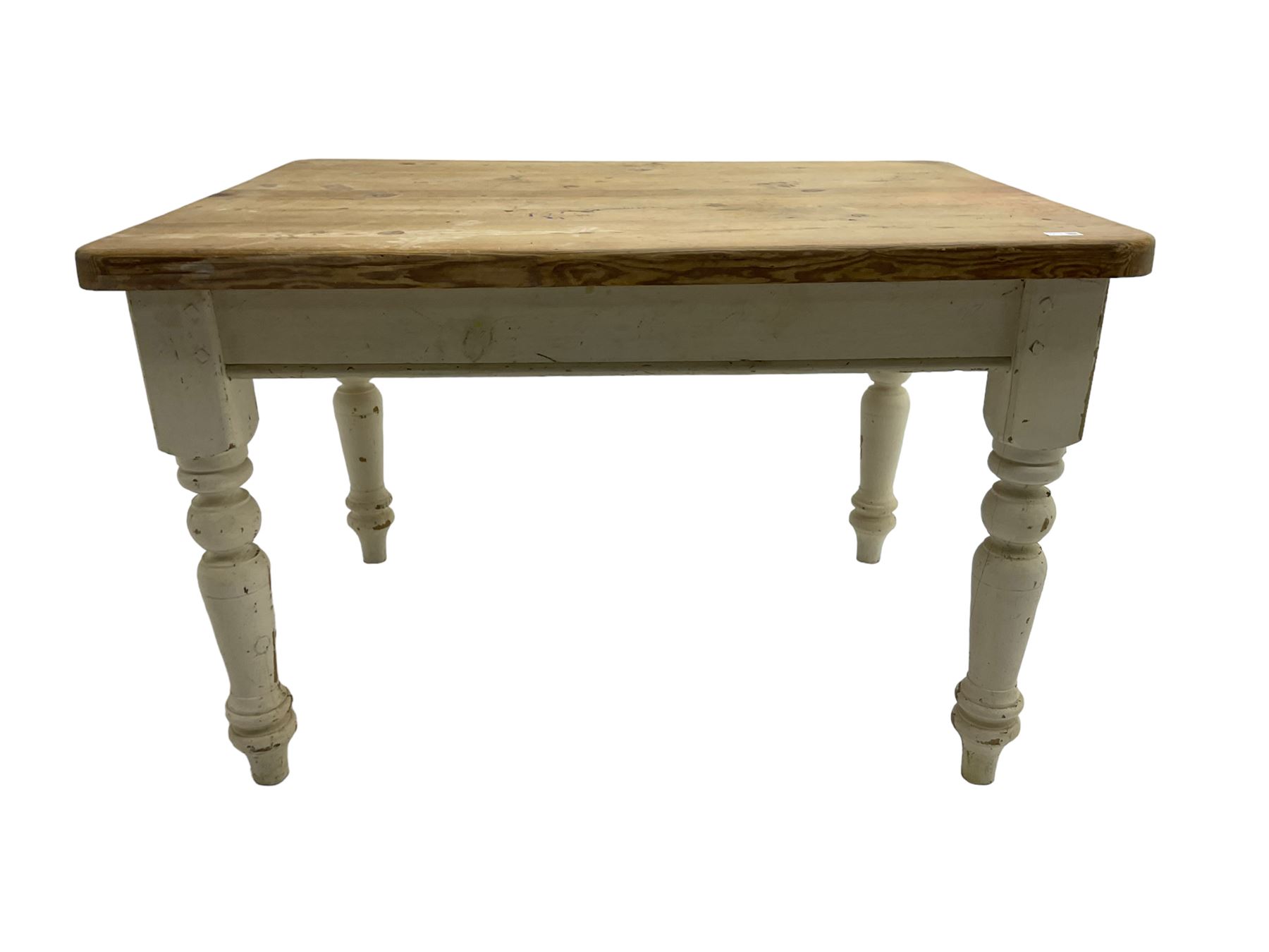 Traditional pine kitchen table with white painted base, rectangular top over single drawer, raised on turned supports