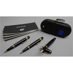  Writing Instruments - Montblanc Boheme set of three fountain pen '18K' gold nib, a ballpoint pen and a propelling pencil in a black leather zip up case, all with warranty/service guide  