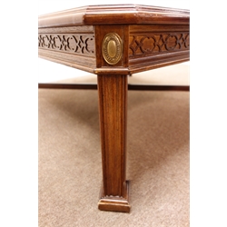  Square mahogany coffee table on fluted supports joined by a stretcher, W102cm, H42cm, D102cm  