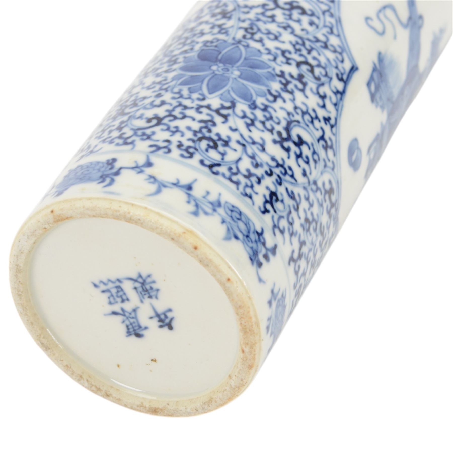 Chinese blue and white cylinder vase, the central panel decorated with vases and domestic objects, with a scrolling floral design, with character marks beneath, H30cm