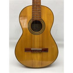 Encore black electric cut-away guitar L96cm; and Spanish Victor Garcia model 187 acoustic guitar, bears label dated 1972 L99cm; each in soft carrying case (2)