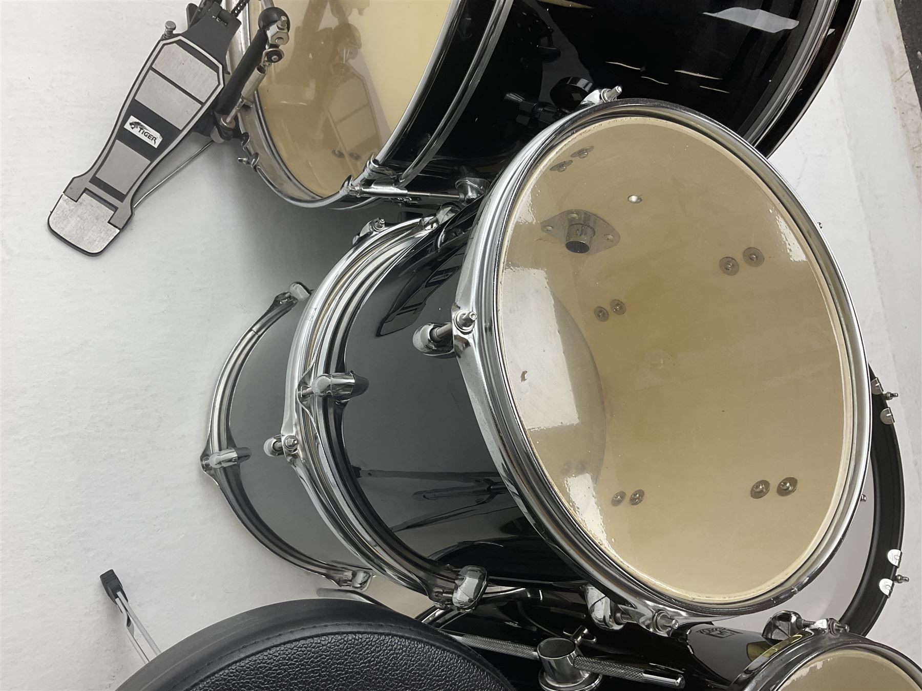 Rockburn eight-piece black drum kit with bass drum, floor tom and five other toms and snare drum; together with two other snare drums; Haosen bass drum; four cymbals; various stands, foot pedals, stool, tri-angle, drum sticks etc