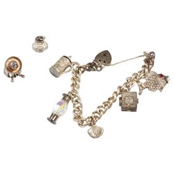 Silver charm bracelet including fish, shell and tankard and two additional silver charms