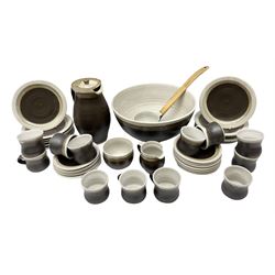Marianne De Trey (British 1913-2016) stoneware coffee service for twelve, together with a large deep stoneware footed bowl and ladle with wood handle, all decorated in Manganese 'Pattern 1' with impressed shell marks, bowl D27cm