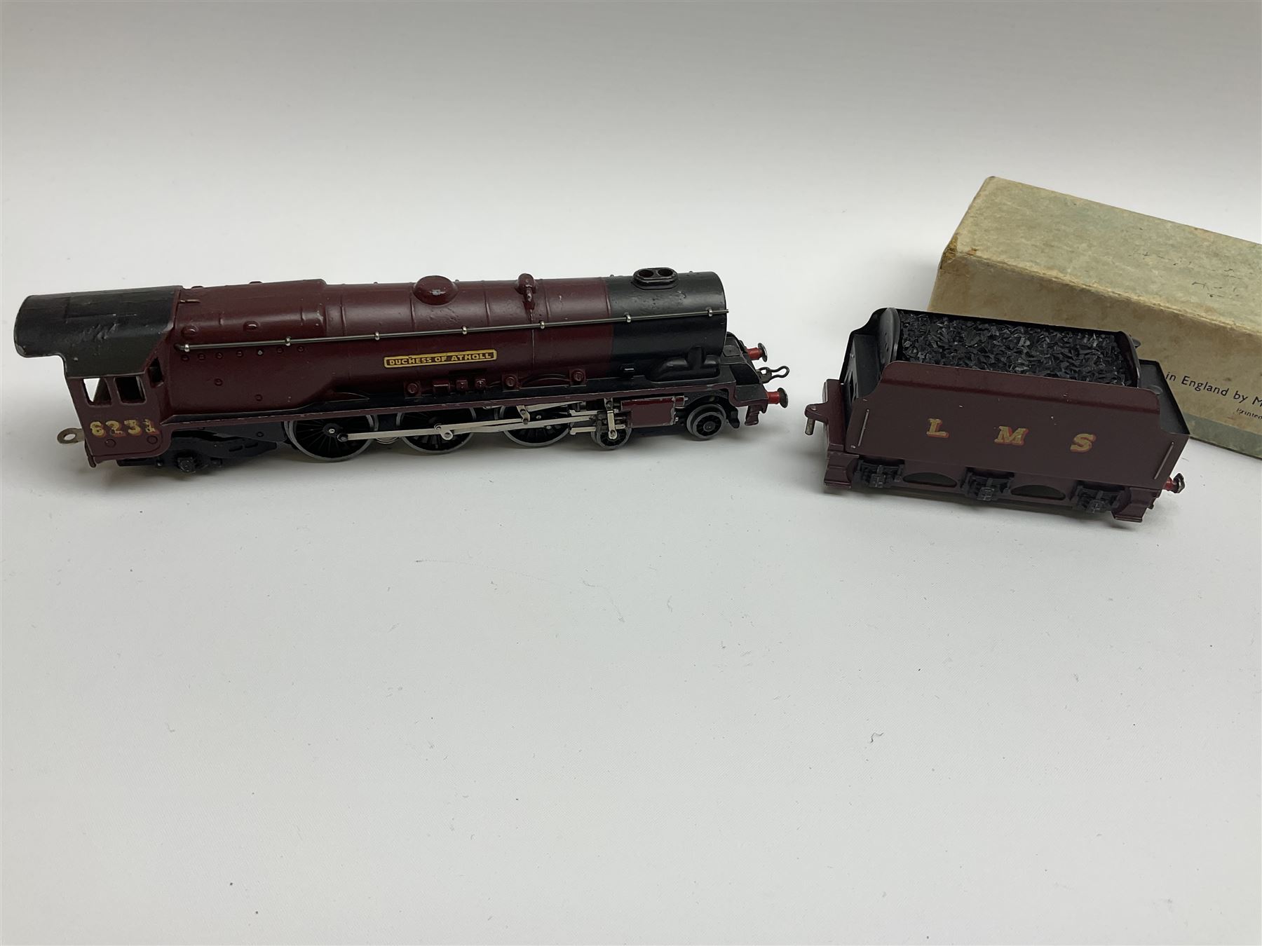 Hornby Dublo - three-rail Duchess Class 4-6-2 locomotive 'Duchess of Atholl' No.6231 with yellow nameplate; in pale blue box; with separate unboxed D2 tender (2)