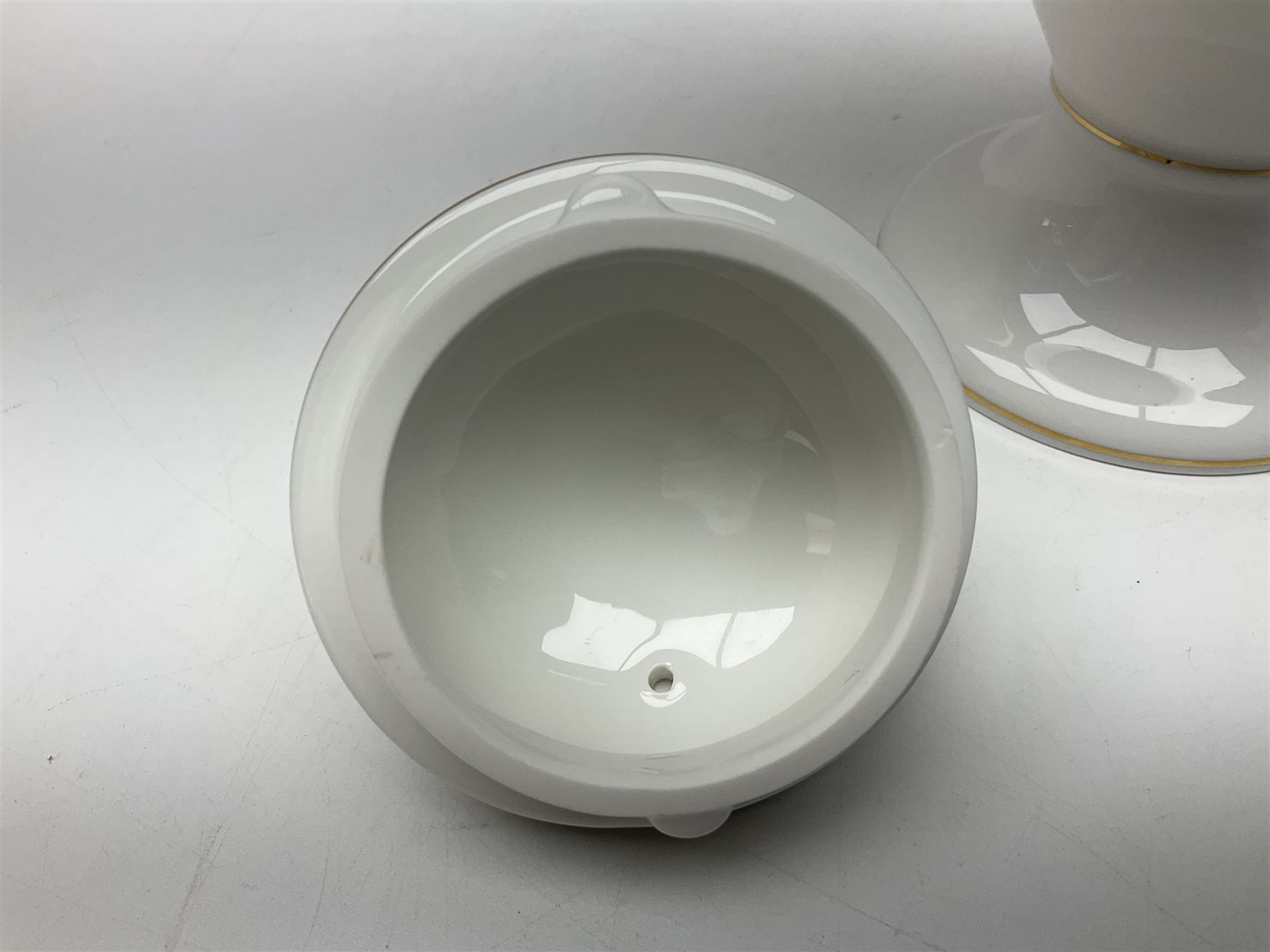 Wedgwood Cornucopia coffee service for six, comprising coffee pot, milk jug, twin handled covered sucrier, coffee cans and saucers