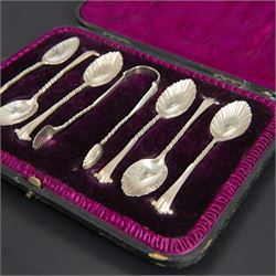 Set of six late Vitorian silver spoons and sugar tongs, each with twist and scroll handles and fluted bowls, hallmarked 	Josiah Williams & Co, London 1894, contained within fitted case