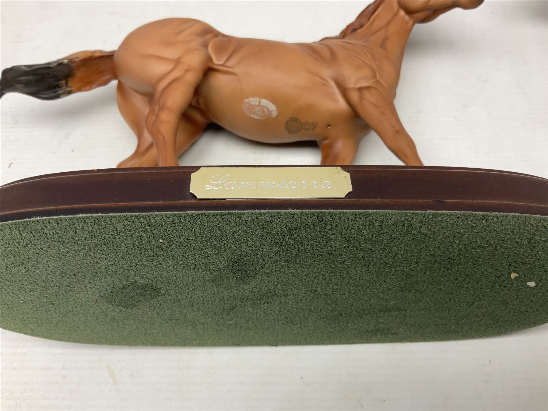 Collection of Beswick horse figures, to include Red Rum on a wooden plinth,  Lammtarra on oval plinth, Morgan Horse Black and three others, together with Royal Daulton Appaloosa Foal and a USSR horse