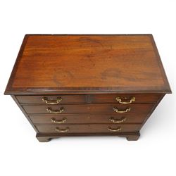 Late 18th century mahogany chest of drawers, rectangular top with moulded edge above two short and three long graduated drawers, with brass swan neck handles, shaped apron and bracket feet