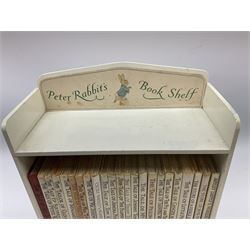 'Peter Rabbit's Book Shelf', containing selection of Beatrix Potter books, mostly library editions, shelf H29cm L27.5cm D11.5cm