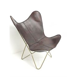 Butterfly chair, gold painted metal frame, dark tan leather slung seat