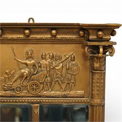 Early 20th-century giltwood tripartite overmantel mirror, rectangular frame with ball decorated cornice above frieze decorated with a classical allegorical depiction of the Triumph of Cybele in a processional chariot drawn by lions, above a beaded moulding and rectangular mirror plate, flanked by plain and reeded pilasters with Corinthian capitals, shafts decorated with pendant garlands  