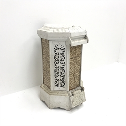 Cast iron white painted stove, tiled front, ornate pierced sides, W31cm, H54cm, D39cm