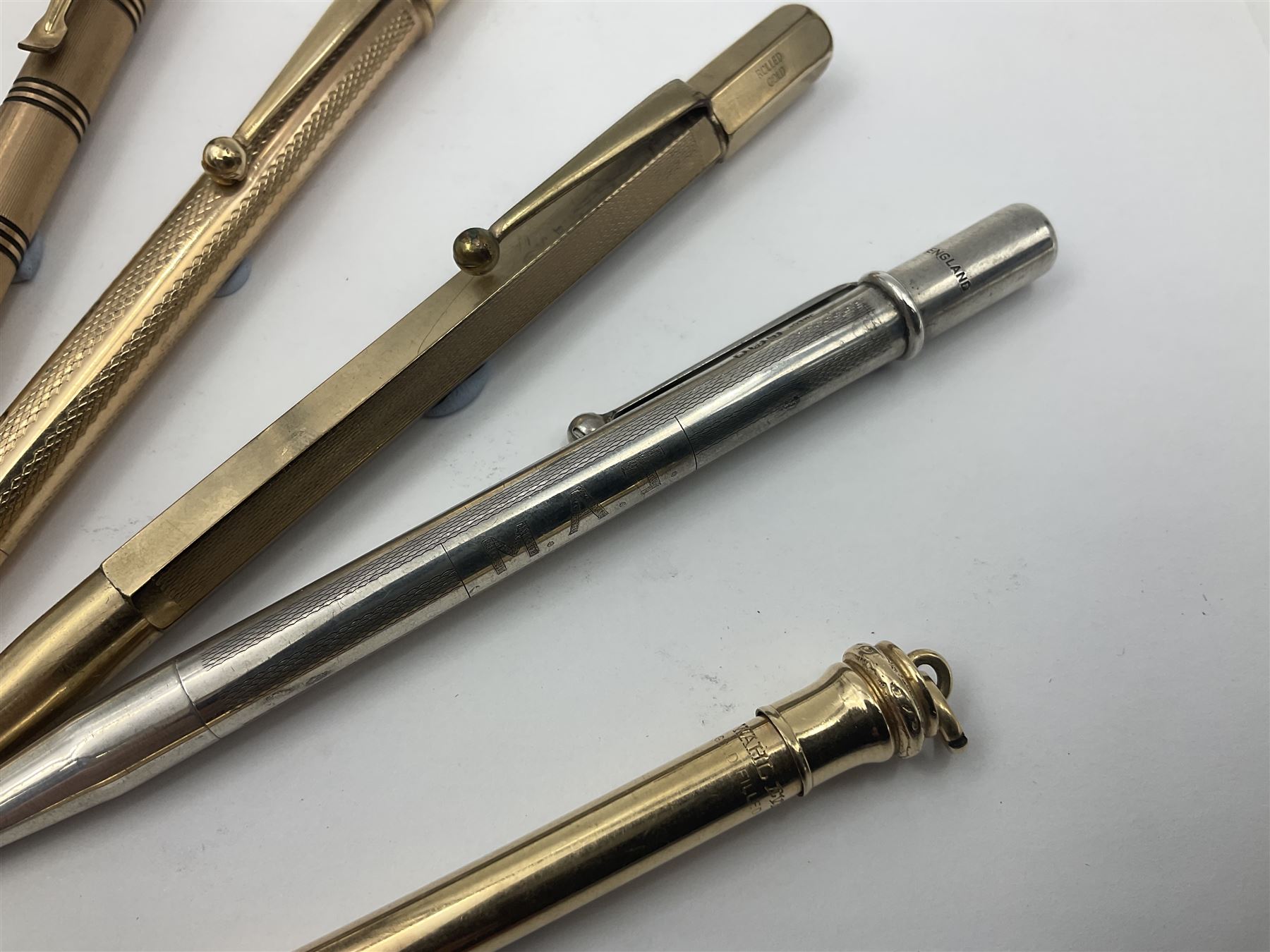 Five gold filled Wahl Eversharp propelling pencils, together with a silver propelling pencil, hallmarked London 1946, J.M.Co Johnson, Matthey & Co, and two further gold filled propelling pencils, one with box, largest L13cm (8)