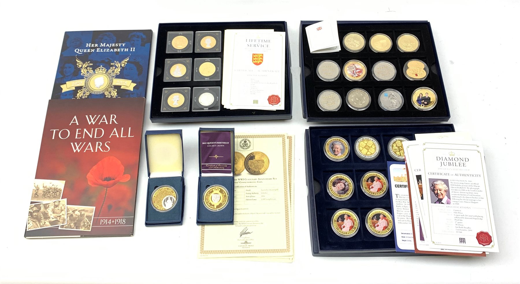 Modern commemorative coins including various Westminster 'Diamond Jubilee' fifty pence coins, three 2011 Bailiwick of Guernsey '40th Anniversary of decimalisation' five pound coins, Bailiwick of Guernsey 2011 commemorative poppy shape five pound coin etc