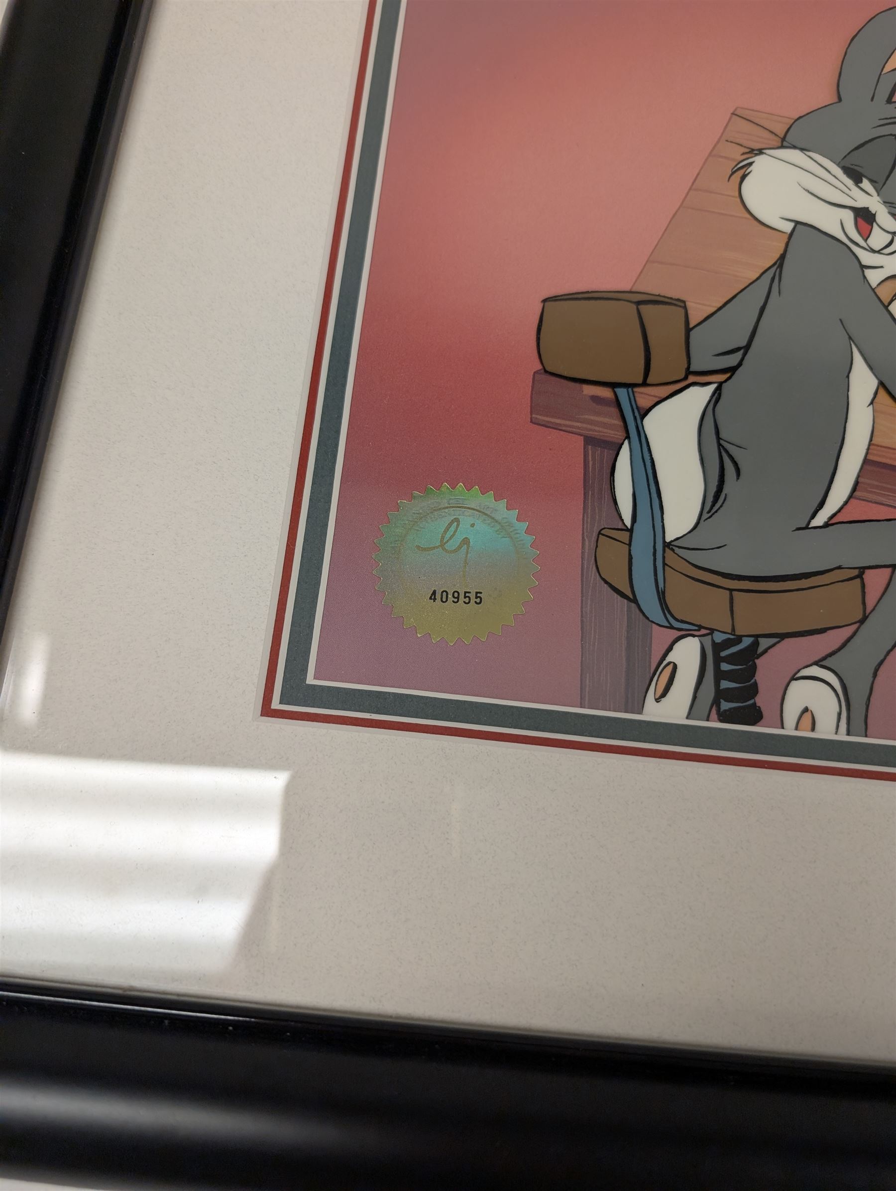 Limited edition 1993 Warner Bros animation art cel 'Ain't I A Stinker' signed by Chuck Jones, depicting Bugs Bunny drawing Daffy Duck,  limited edition 172/500, with Certificate of Authenticity, framed and glazed, frame H46cm