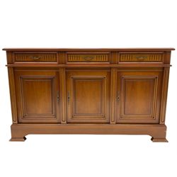 Contemporary cherry wood sideboard, rectangular moulded top over three drawers and three cupboards
