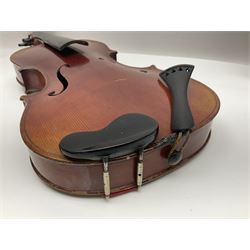 Late 19th century French three-quarter size 'Conservatory' violin with 34cm two-piece maple back and ribs and spruce top, the peg box inscribed 'Conservatory Violin Straduari', bears label 'Antonius Stradiuarius Cremonensis Faciebat Anno 1721' L55.5cm overall; in ebonised wooden 'coffin' case; and Saxony violin c1900 with 36cm two-piece maple back and ribs and spruce top; bears label 'Antonius Stradivarius Cremonensis Faciebat Anno 17**' L59cm overall; in carrying case (2)