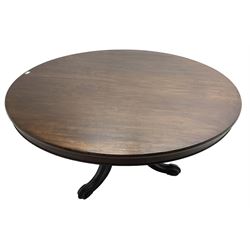 Victorian mahogany breakfast table, the circular tilt-top on carved pedestal, three moulded supports carved with bellflowers and scrolled terminals 