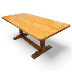 Mouseman - adzed oak 6’ refectory dining table, rectangular top with visible dowel pegs and adzed surface, raised on octagonal carved supports with stretcher and sledge feet, carved mouse signature to leg, by the workshop of Robert Thompson, Kilburn
